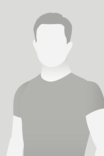 Das Bild zeigt eine stilisierte, graue Silhouette eines Mannes ohne erkennbares Gesicht auf grauem Hintergrund.