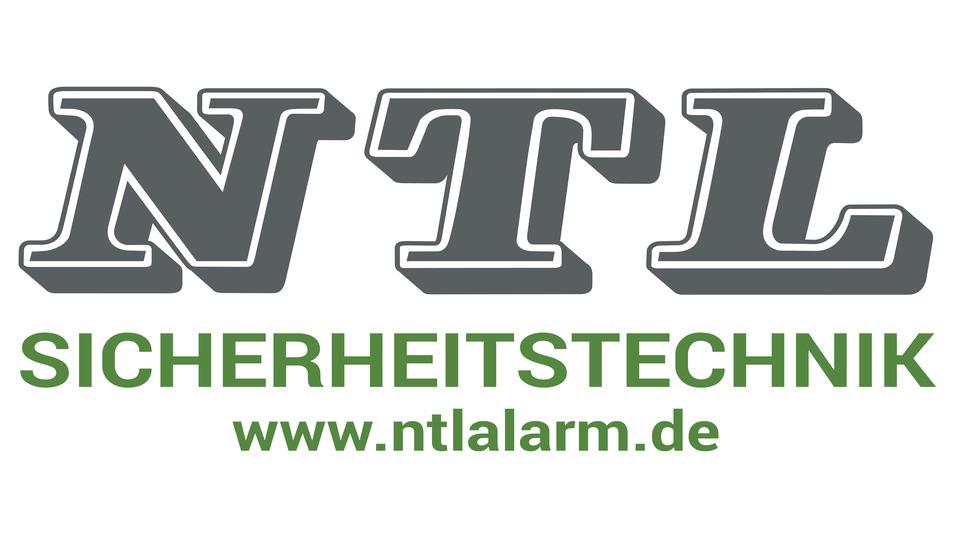 Logo von NTL mit dem Schriftzug &bdquo;SICHERHEITSTECHNIK&ldquo; und der Internetadresse &bdquo;www.ntalarm.de&ldquo; in zwei Farben.