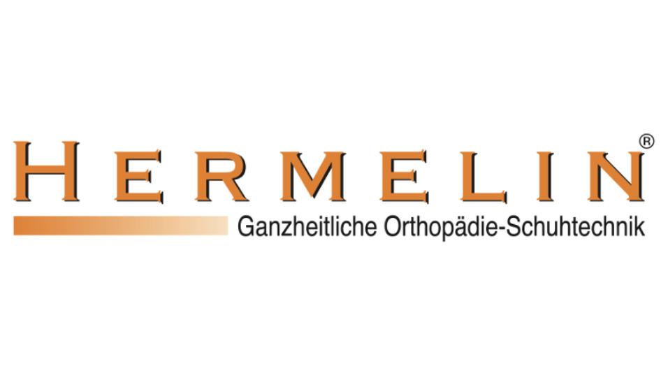 Logo von Hermelin, ganzheitliche Orthop&auml;die-Schuhtechnik, mit orangefarbener Schrift auf hellem Hintergrund.